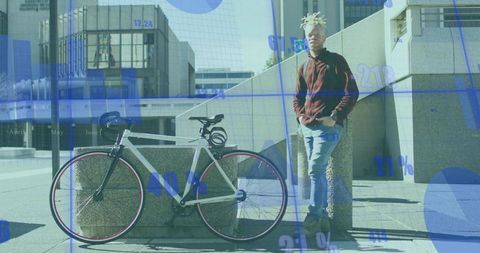 Urban cyclist leaning on bollard beside white fixed-gear bike with blue data overlay