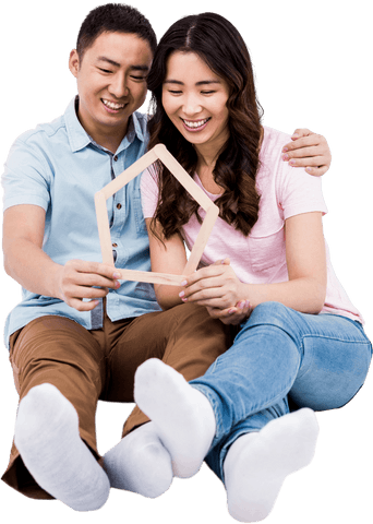 Smiling Couple Holding Transparent Wooden House Frame - Download Free Stock Videos Pikwizard.com