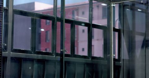 Industrial Window Design Overlooks Urban Brick Facade