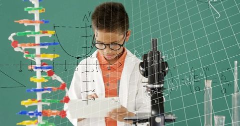 Curious Schoolboy Engaged in Science and Technology in Classroom - Download Free Stock Images Pikwizard.com