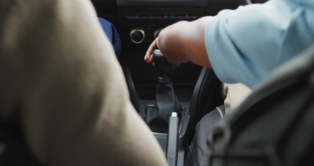 Close-Up of Hand Using Gear Shift in Car Interior - Download Free Stock Images Pikwizard.com