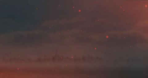 Ethereal Red Particles Over Misty Cityscape