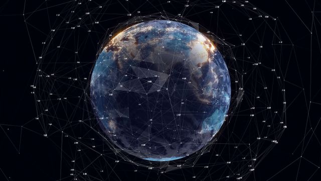 Global communications concept with revolving Earth surrounded by fine network lines. Suggests international connectivity and technology integration, perfect for use in technology presentations, futuristic animations, or global communication material.