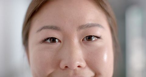 Close-up Neutral Expression of Young Asian Woman with Copy Space