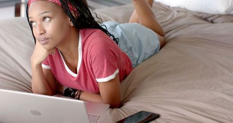 Young woman engagement with laptop in casual outdoor atmosphere