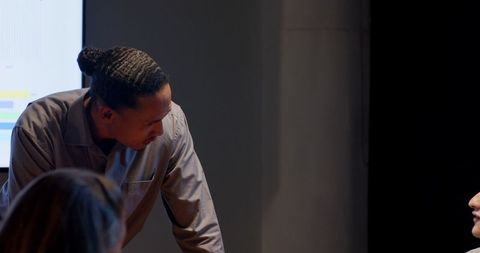 Team Brainstorming During Late-Night Office Meeting