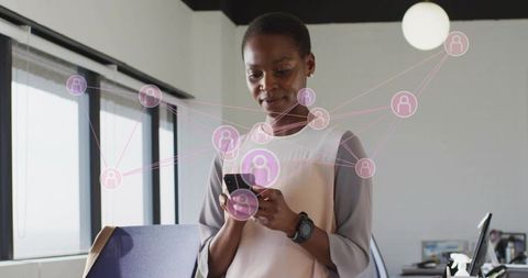 Businesswoman Exploring Digital Network on Smartphone in Office