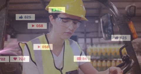 Worker in Factory Receiving Digital Social Media Notifications