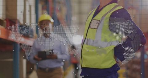 Warehouse Supervisor in Reflective Vest with Inspector Using Tablet