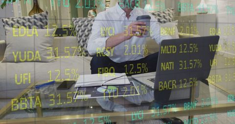 Stock Market Analyst Working Remotely with Digital Display
