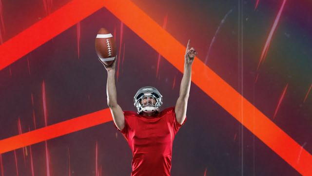 This energetic video shows an American football player in a red jersey celebrating a victory by holding the ball aloft. The vibrant athleticism and dynamic background make it perfect for use in sports event promotions, advertisements targeting sports enthusiasts, and motivational posters.