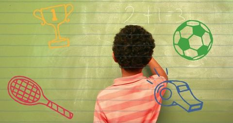 Child learning on chalkboard with school and sports icons