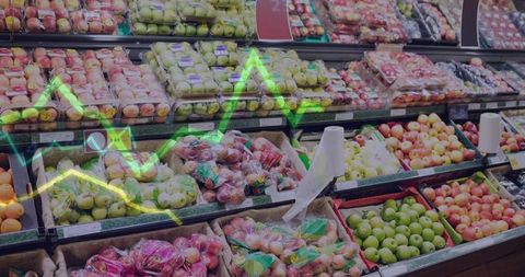 Grocery store produce aisle with fresh apples and market indicator
