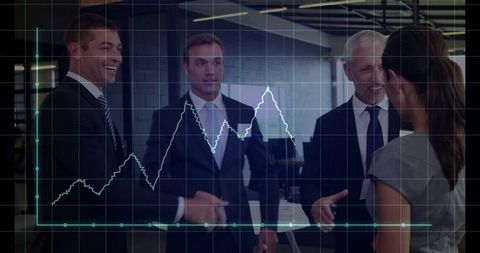 Business Collaboration Amid Stock Market Analysis in Modern Office