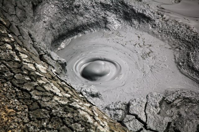 Bubbling Mud Volcano Creating Natural Patterns in Geothermal Area - Download Free Stock Photos Pikwizard.com