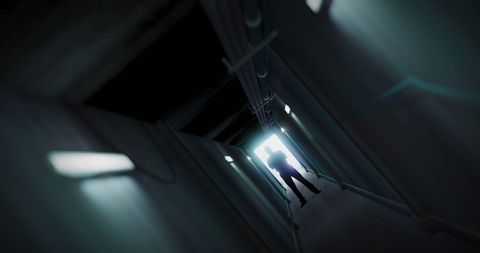 Mysterious Silhouette in Dark Tunnel with Single Light Source - Download Free Stock Images Pikwizard.com