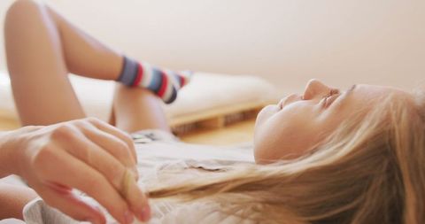 Young woman relaxing at home leisure weekend