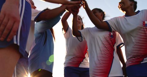 Female Football Players Uniting on Sports Field for Team Spirit - Download Free Stock Images Pikwizard.com