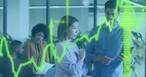 Team Discussing Financial Trends with Data Holograph