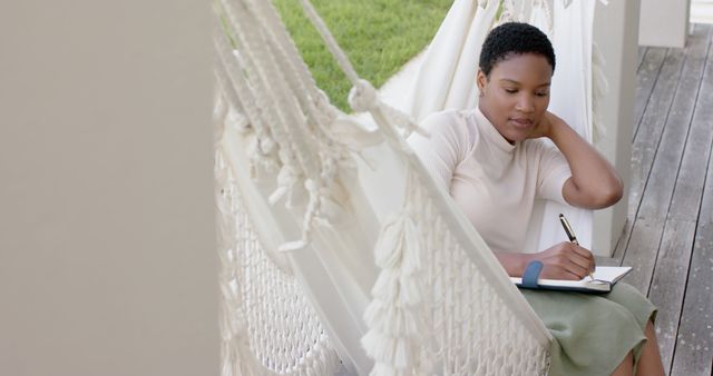 Young Woman Journaling Outdoors in a Hammock - Download Free Stock Images Pikwizard.com