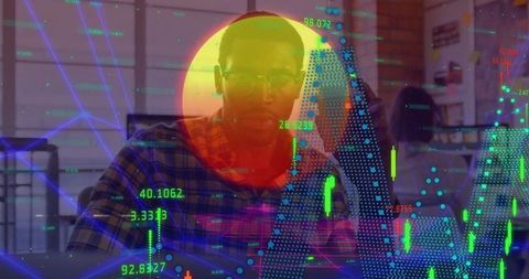 Focused analyst examining financial data with stock market graphics