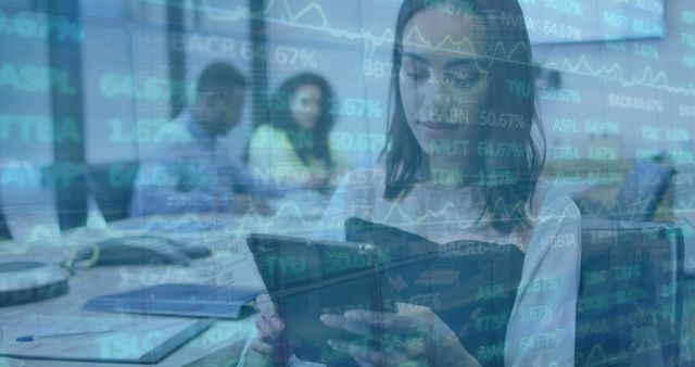 Young Businesswoman Analyzing Stock Market Data on Tablet - Download Free Stock Images Pikwizard.com