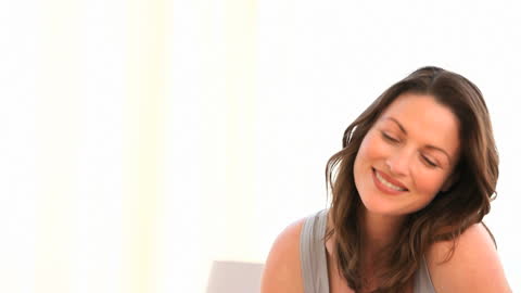 Smiling Woman Enjoying Serenity in Bright Setting