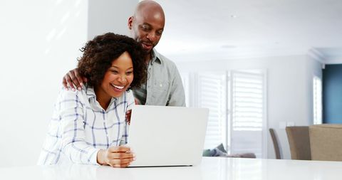 Middle-Aged African American Couple Collaborating on Laptop - Download Free Stock Images Pikwizard.com