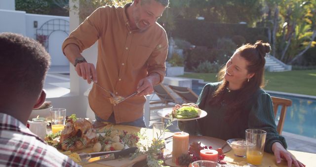 Family Enjoying Outdoor Thanksgiving Dinner by Poolside - Download Free Stock Images Pikwizard.com