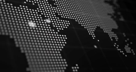 Dotted world map with glowing nodes on dark grid showing global network visualization