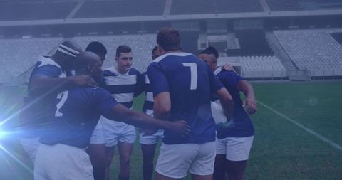 Rugby Players in Team Huddle Preparing for Match