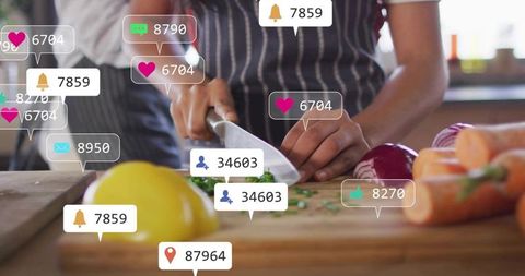 Social Cooking Chopping Herbs with Live Notifications, Apron Hands on Rustic Cutting Board