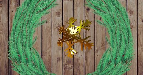 Gold Snowflake with Green Branches on Rustic Wood - Download Free Stock Images Pikwizard.com