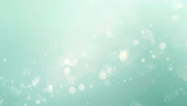 Mint teal bokeh glow with soft gradient and floating light orbs for minimal design