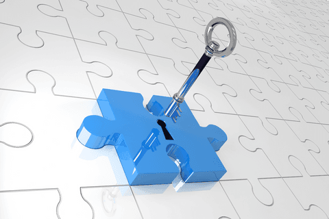 Transparent key and puzzle concept on blue and white background