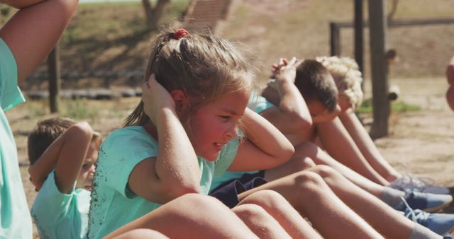 Children Exercising Outdoors Doing Sit-Ups at Summer Camp - Download Free Stock Images Pikwizard.com