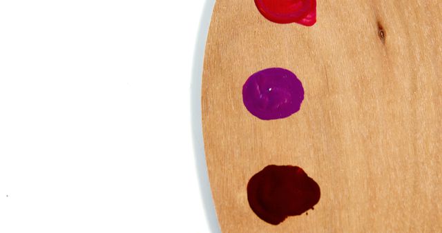 Colorful Paint Blobs on Wooden Palette - Download Free Stock Images Pikwizard.com