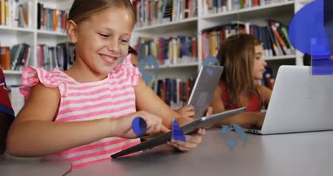 Young Students Engaging with Digital Learning Tools in Classroom