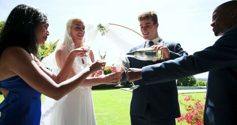 Multiracial Wedding Celebration in Lush Garden Setting