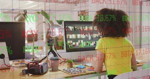 Businesswoman analyzing stock data in modern office enviroment