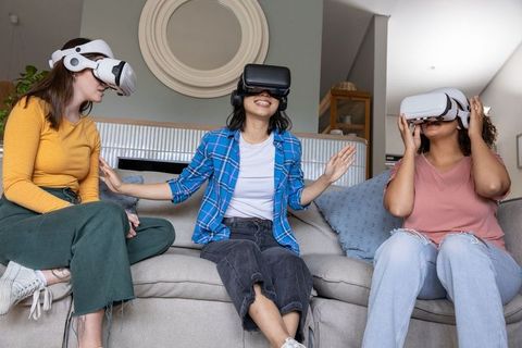 Diverse Women Enjoying Virtual Reality Experience at Home