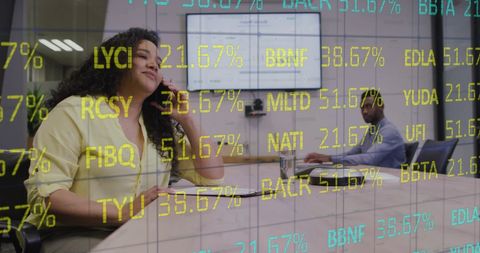 Business Professionals Collaborating Amidst Stock Market Data