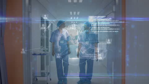 Innovative Healthcare: Doctors Analyzing Digital Data in Hospital Corridor