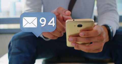 Person Checking Smartphone with Email Notification Popup