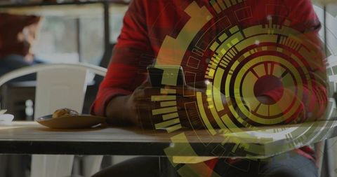 Man using smartphone in cafe with futuristic hud overlay, casual digital interaction