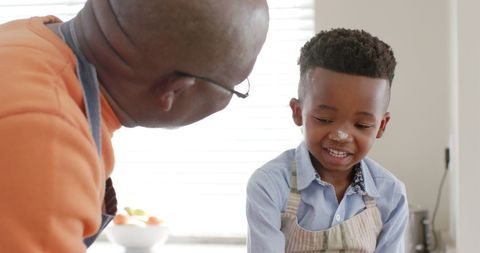 Grandfather and Grandson Baking Muffins in Kitchen - Download Free Stock Images Pikwizard.com