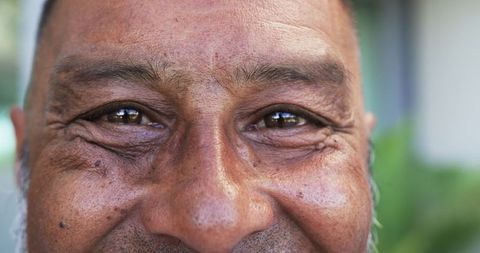 Close-Up of Biracial Man with Warm, Peaceful Smile