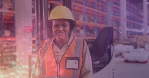 Female Warehouse Worker Smiling in Safety Vest Among Pallets - Download Free Stock Images Pikwizard.com