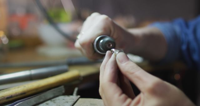 Close-Up of Jeweler Working on Ring with Tool - Download Free Stock Images Pikwizard.com