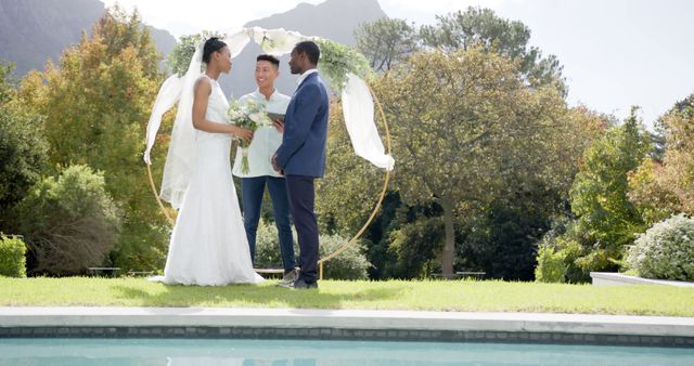 Outdoor Multiracial Wedding Ceremony near Pool with Mountains Background - Download Free Stock Images Pikwizard.com